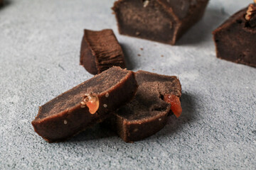 Banana Bread Loaf with nut on grey background. Morning breakfast background. Close up view recipes for healthy diet.