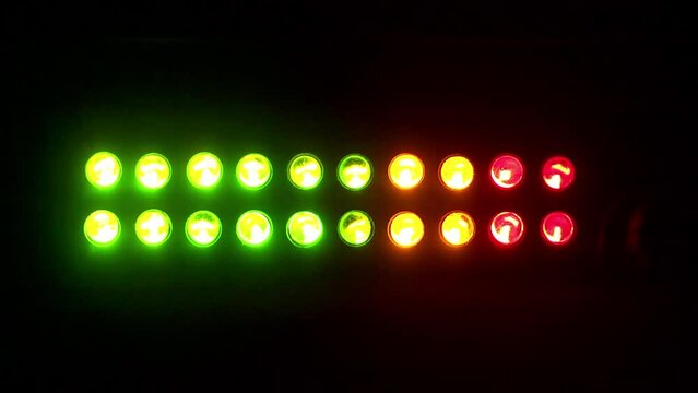 LED audio meters against a black background - Looping