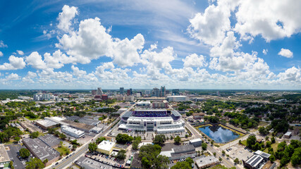 Aerial view of downtown Orlando with the Orlando City Soccer (Lions) stadium in the foreground.   The word 
