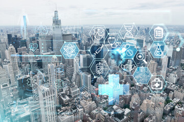 Aerial panoramic city view of Upper Manhattan, the East Side, river and Brooklyn on horizon, New York city, USA. Health care digital medicine hologram. The concept of treatment and disease prevention