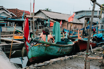 Fototapeta na wymiar Fishing net boats at the harbor