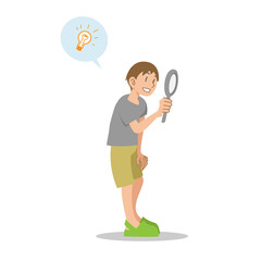 虫眼鏡を見る子供