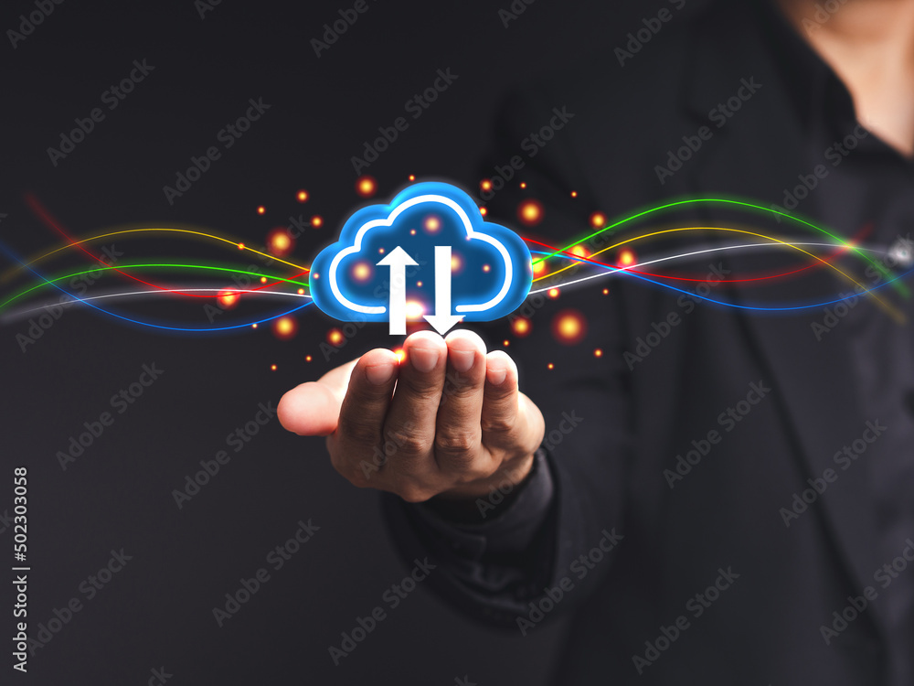 Poster businessman hand holding virtual cloud computing icon in the palm while standing on a gray backgroun