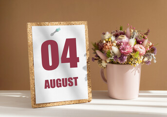 august 4. 4th day of month, calendar date.Bouquet of dead wood in pink mug on desktop.Cork board with calendar sheet on white-beige background. Concept of day of year, time planner, summer month