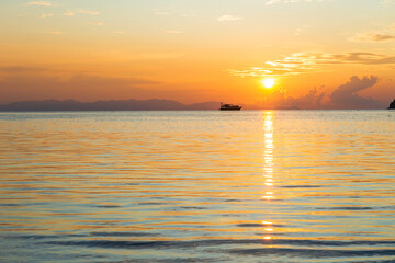 Beach and sea view on Lipe island, Satun Province, Thailand, andaman sea where you can watch the sunrise and sunset on the same beach.