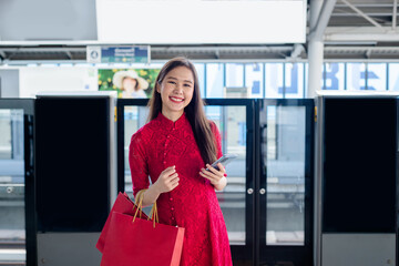 women in red dress in mrt