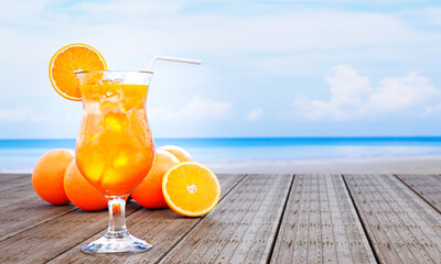 Orange juice in a clear glass with ice cubes and orange juice at the mouth of the glass. Cold drinks placed on the wooden balcony by the sea In the middle of the day. 3D rendering