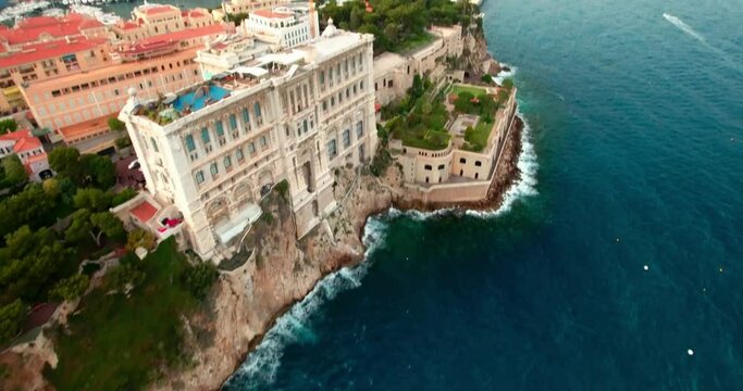 Aerial Tilt Up Shot Of Musee Oceanographique De Monaco In City, Drone Flying Over Sea