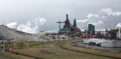 Steel factory plant with chimneys