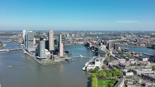 Rotterdam city skyline in The Netherlands drone view of the Maas and office buildings city view. Destination in Holland. Erasmusbrug and river Maas urban city view.