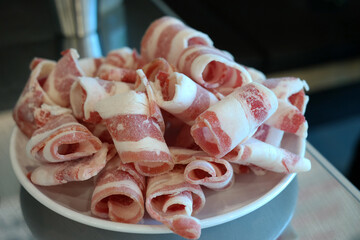 Frozen pork belly prepared by cutting thin and flat