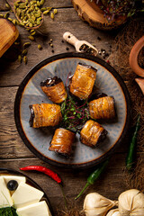 Fototapeta premium Georgian eggplant appetizer badrijani portion on the table