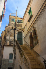 Narrow street of the city of Amalfi, Italy