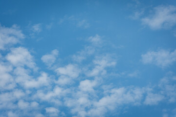 Naklejka na ściany i meble Blurred background from blue sky clouds in rainy season,soft and blur focus.