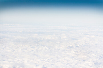 View of thick clouds from the height of the plane.