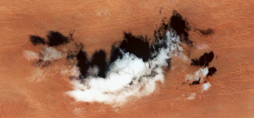 abstract landscape photo of the deserts of Africa from the air emulating the shapes and colors of...