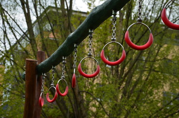 outdoor sports ground for children and adults. handcuffing, climbing rope. parallel bars and...