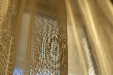 Curtains on window. Light through fabric.