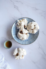 Popular Chinese street food. Char Siu Bao aka Barbecue Pork Bun. A favorite choice in Chinese dim...