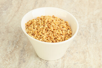 Crunched roasted peanut in the bowl