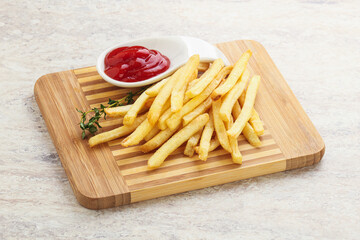 French fried potato over board