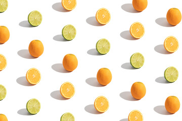 Pattern with citrus sliced orange and lime isolated on white. Abstract summer background