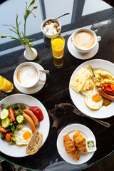 Delicious Breakfast for Two at the Luxury Hotel, Eggs, Sausages, Vegetables, Croissants Coffee, Orange Juice