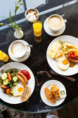 Delicious Breakfast for Two at the Luxury Hotel, Eggs, Sausages, Vegetables, Croissants Coffee, Orange Juice