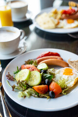 Delicious Breakfast for Two at the Luxury Hotel, Eggs, Sausages, Vegetables, Croissants Coffee, Orange Juice
