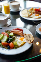 Delicious Breakfast for Two at the Luxury Hotel, Eggs, Sausages, Vegetables, Croissants Coffee, Orange Juice