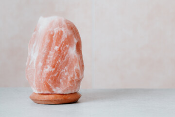 Himalayan salt lamp on table, stress control, calming home decor