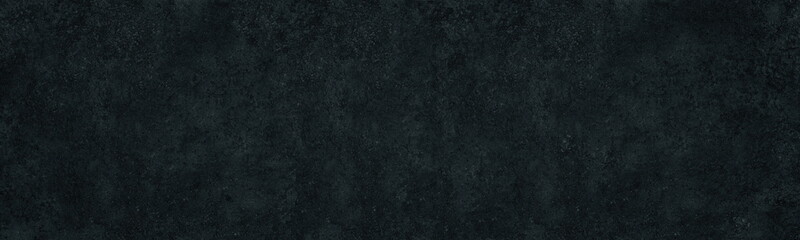 Black rough plaster surface panoramic texture. Textured shabby wall panorama. Dark grey backdrop. Gloomy grunge abstract background