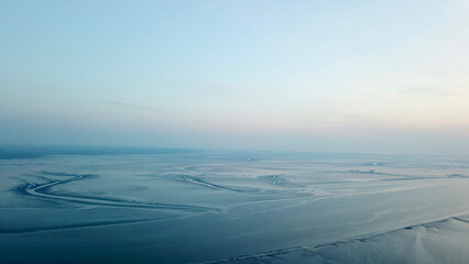 Fototapeta na wymiar Wattenmeer der Nordsee bei Sonnenuntergang