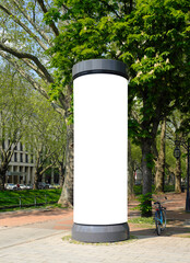 empty advertising pillar in a city with free copy space, promotion mockup - 502336241
