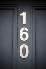 Number one hundred and sixty on doorway