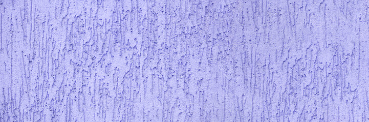 Banner with concrete purple wall background on the street.