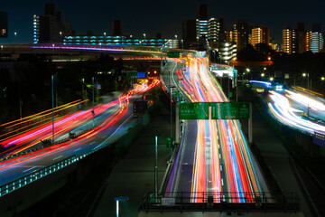 A night timelapse of the traffic jam at the urban street in Tokyo