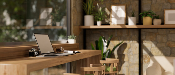 Minimal coffee shop seating area interior with laptop mockup on coffee table.