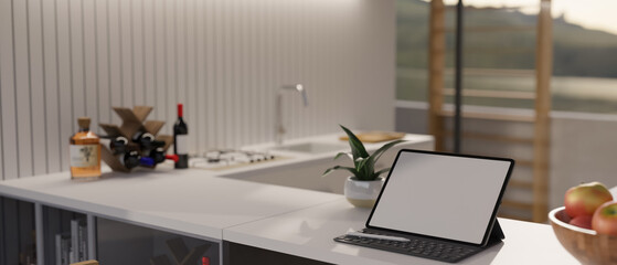Portable tablet mockup on a modern white kitchen countertop