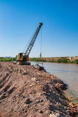 site with crane and sky