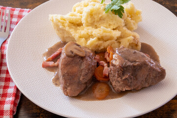 rooster with mash on a plate