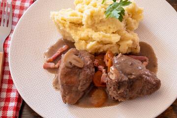 rooster with mash on a plate