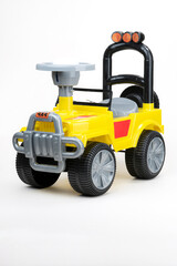 Children's toy. Yellow plastic car