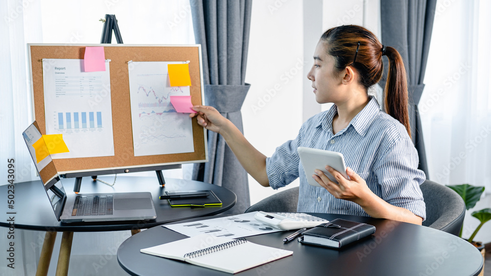 Poster business woman holding tablet to checking email during looking data to reading business chart and pu