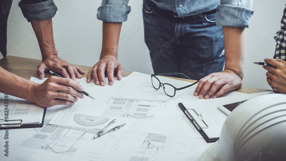 Wall mural architecture engineer teamwork meeting, drawing and working for architectural project and engineerin