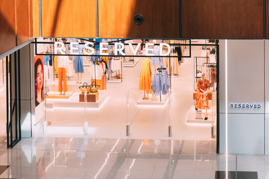 Dubai, UAE, United Arab Emirates - May 22, 2021: View of Reserved store in Dubai mall shopping center. Reserved is a Polish clothing store chain, , part of LPP. Mannequins dressed in female woman