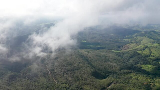 aerial view of clouds and mountains in mountain region in Serra da Canastra.