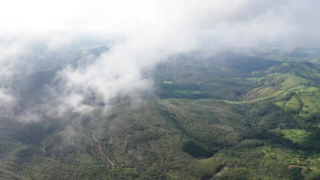 aerial view of clouds and mountains in mountain region in Serra da Canastra.
