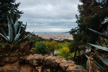 Beautiful view across city to sea from Guell park in Spain