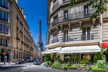 Rolgordijnen Paris, France - May 27, 2021: Eiffel tower between haussman buildings in Paris © JEROME LABOUYRIE
